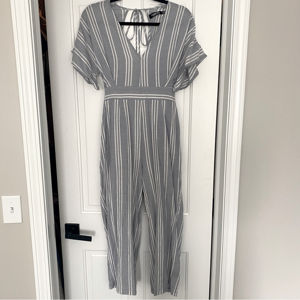 Crystal Sky boutique brand open back jump suit